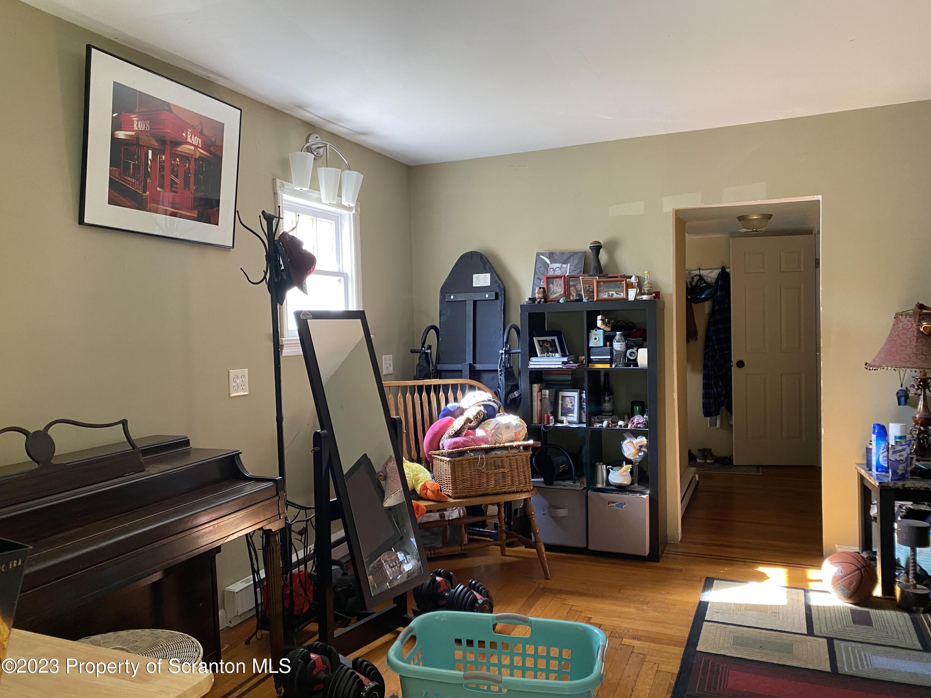 1058 Interchange Road Gilbert, PA 18331 - Photo 10 of 17 a living room with furniture and a flat screen tv