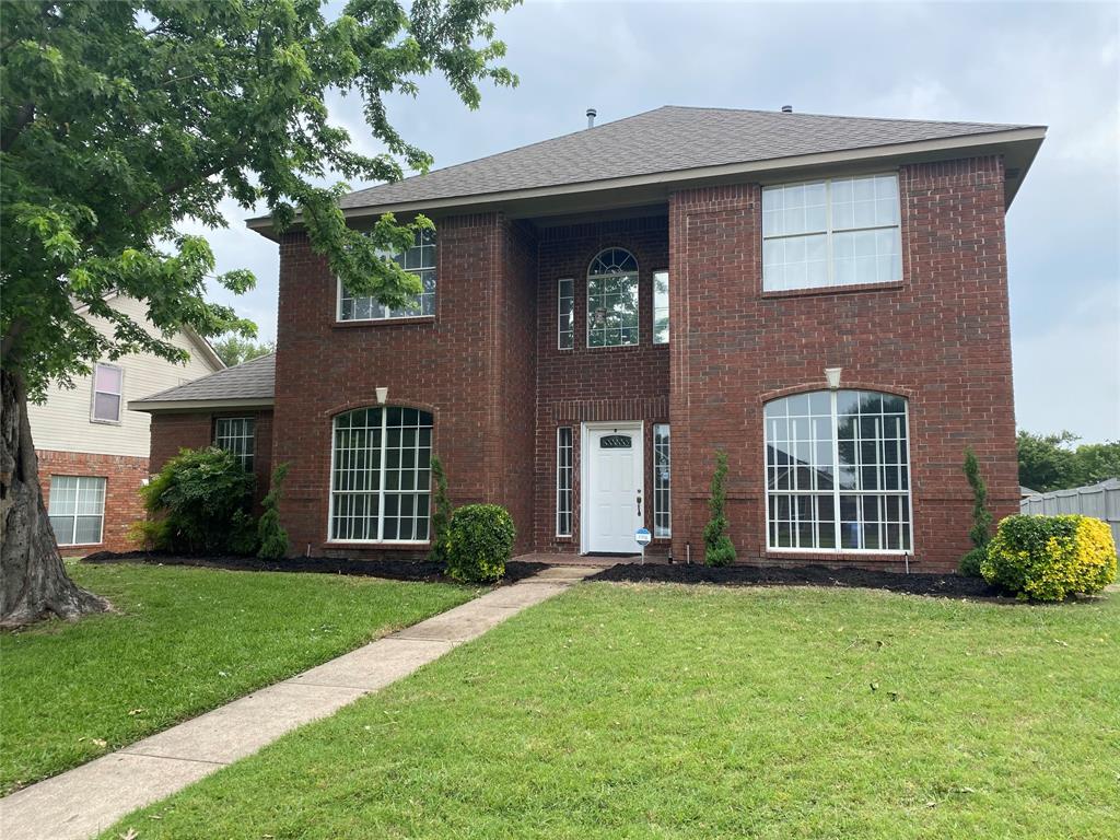 621 Ridgemont Drive Allen, TX 75002 - Photo 1 of 1 a front view of a house with a garden