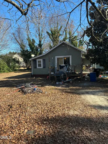 a house view with a backyard space
