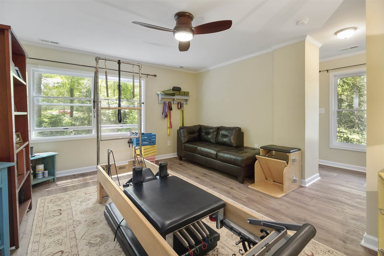 2908 Sandia Drive Raleigh, NC 27607 - Photo 21 of 29 This spacious bedroom is currently a pilates studio with attached full bath. Bedroom