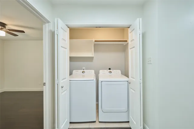 a utility room with dryer and washer