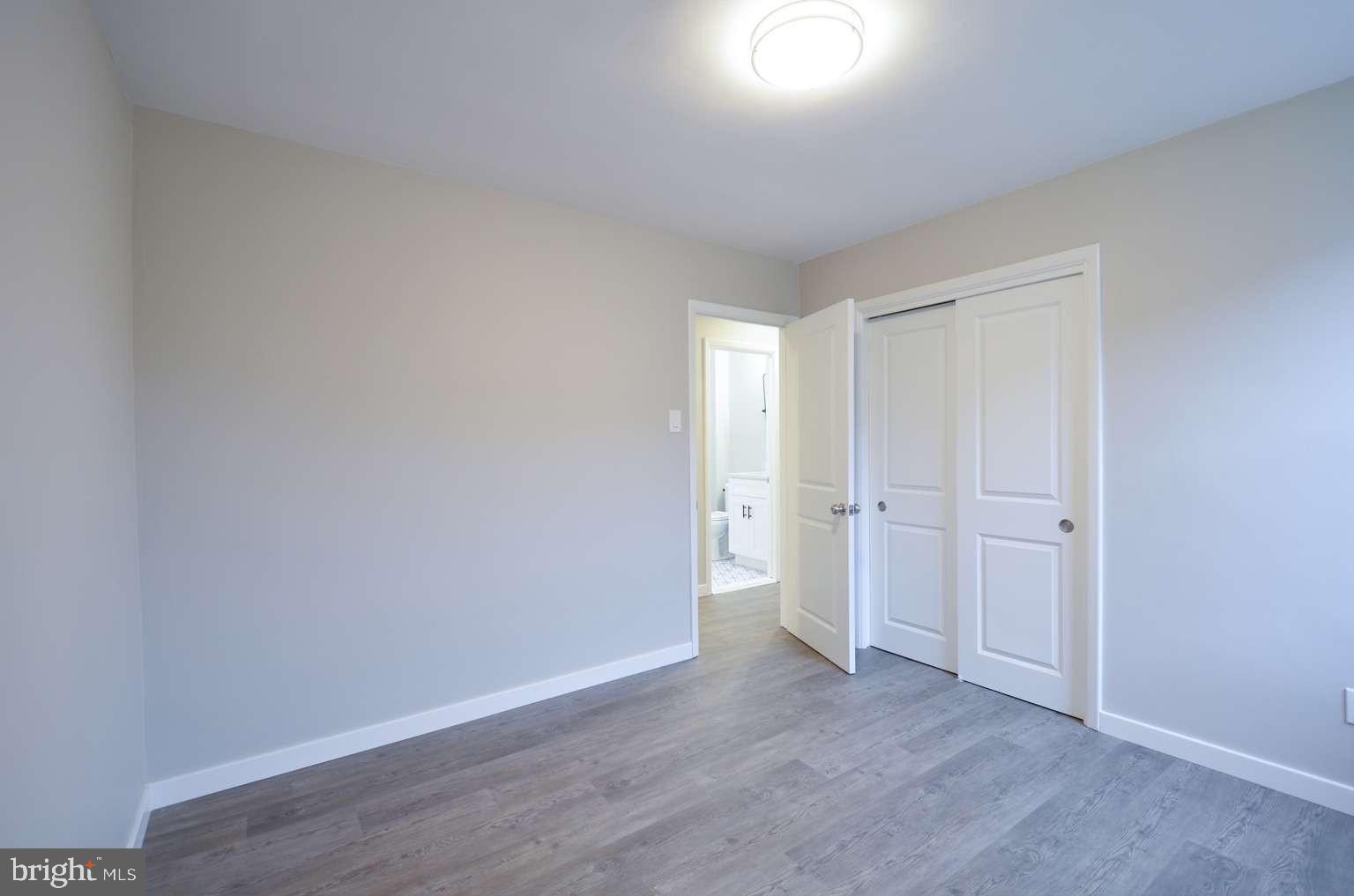 8213 Colfax Street Philadelphia, PA 19136 - Photo 12 of 25 a view of an empty room and wooden floor