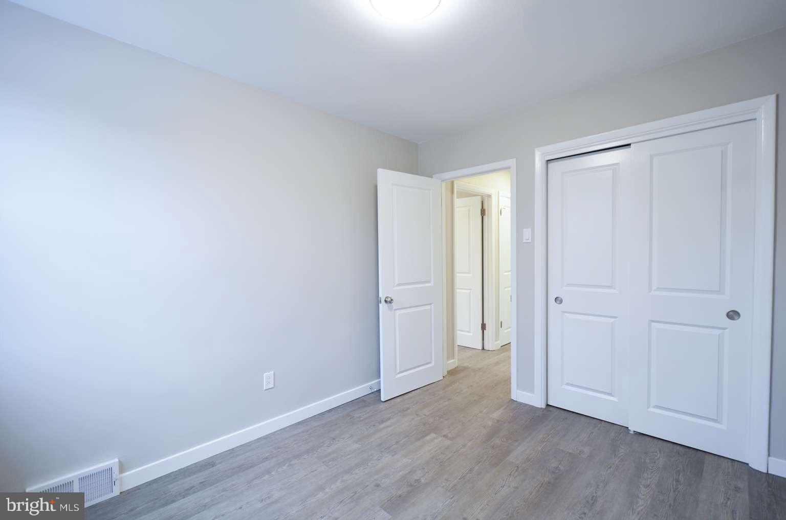 8213 Colfax Street Philadelphia, PA 19136 - Photo 13 of 25 a view of an empty room and wooden floor
