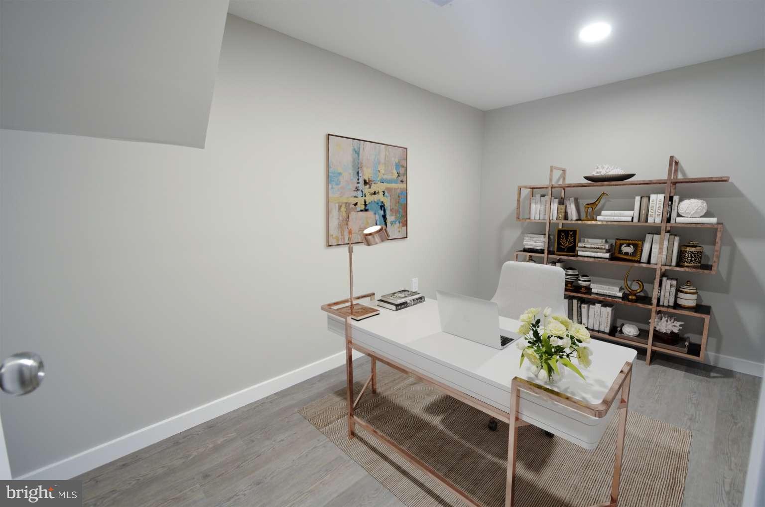 8213 Colfax Street Philadelphia, PA 19136 - Photo 21 of 25 a hallway with a table and chairs