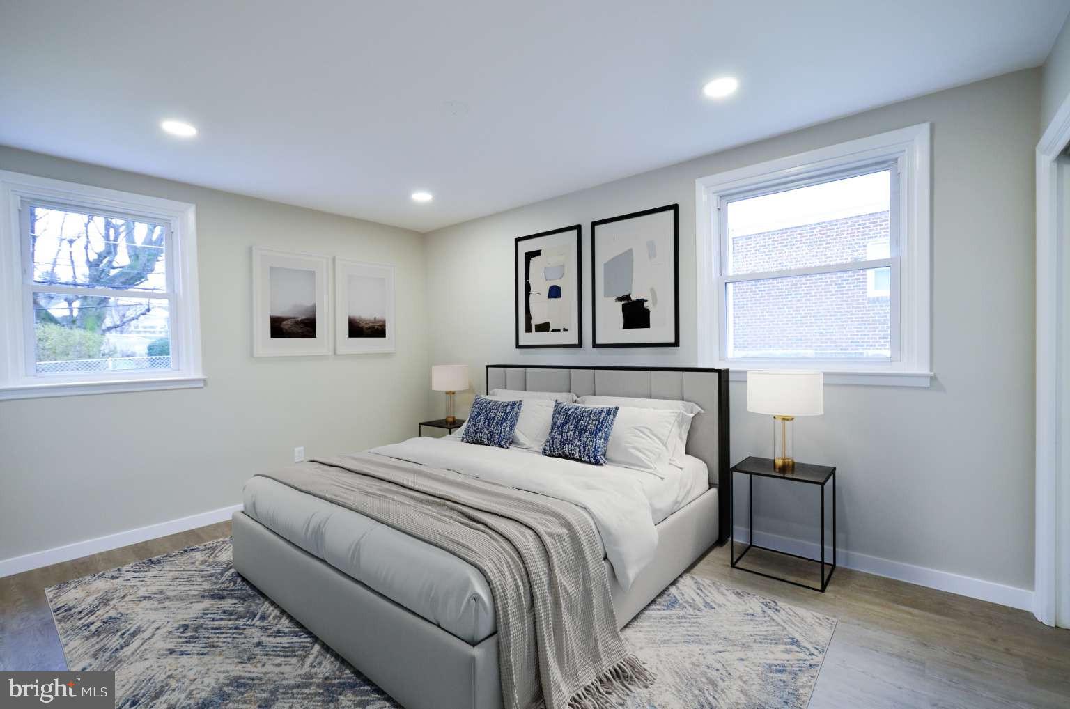 8213 Colfax Street Philadelphia, PA 19136 - Photo 10 of 25 a bedroom with a bed and a window