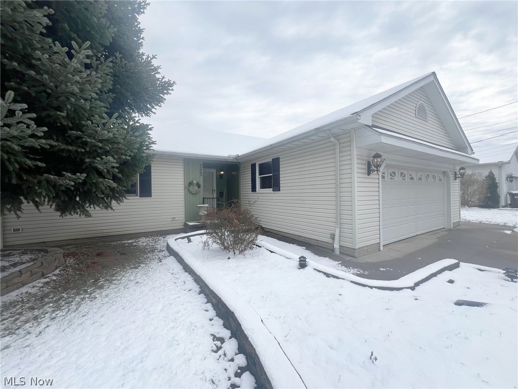 5203 Ridgeland Street Lorain, OH 44055 - Photo 2 of 39 Single story home with a garage