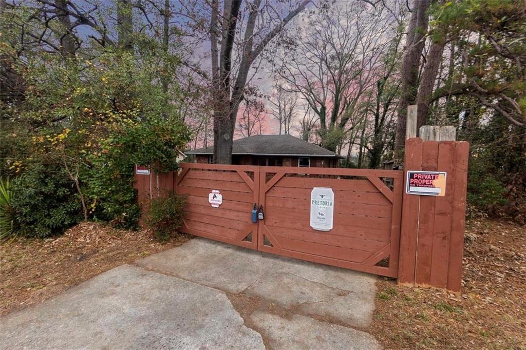 3308 Fern Drive Tucker, GA 30084 - Photo 6 of 19 a view of outdoor space with sign board