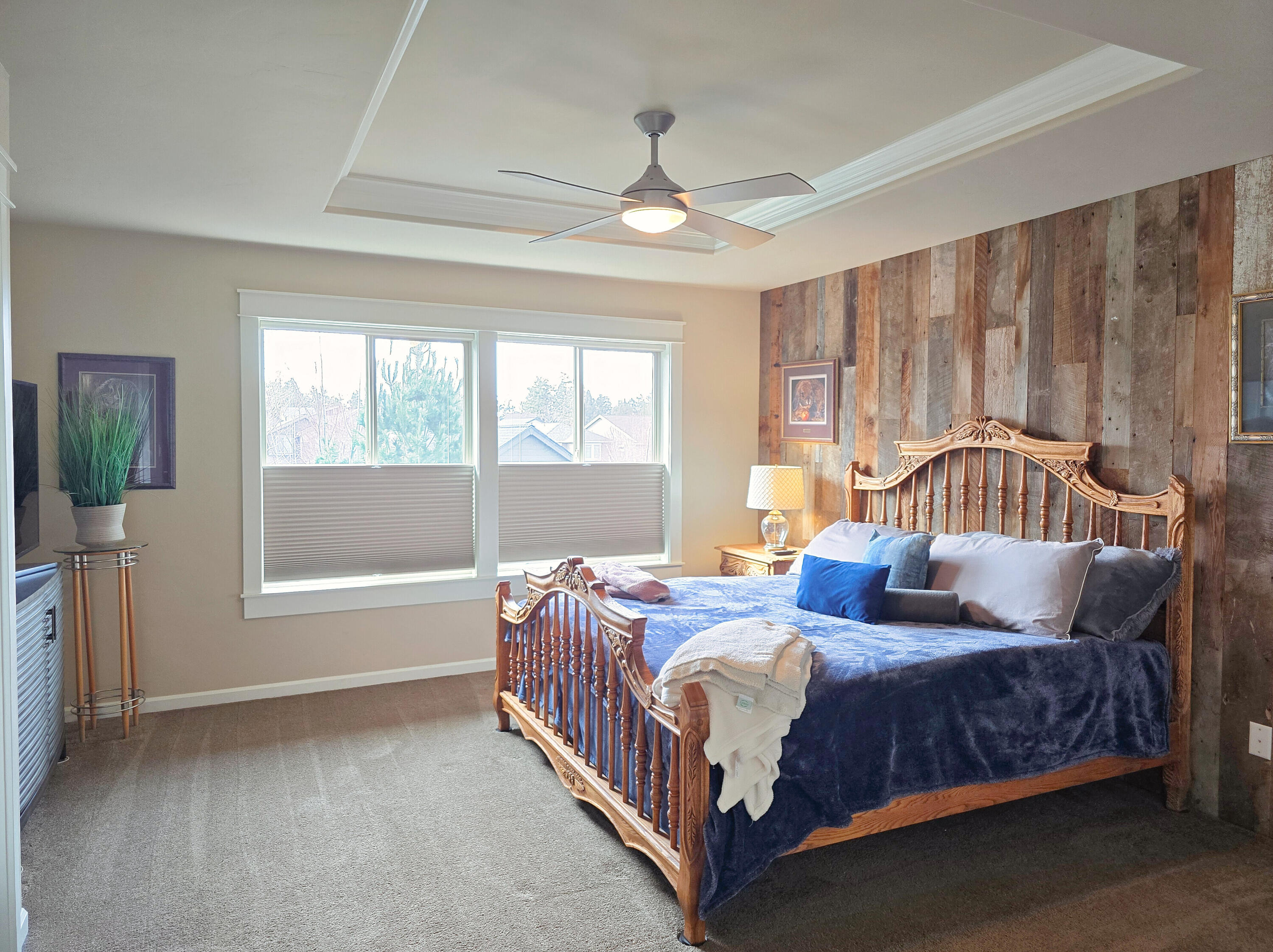 61072 Manhae Loop Bend, OR 97702 - Photo 21 of 63 a bedroom with a bed and a window