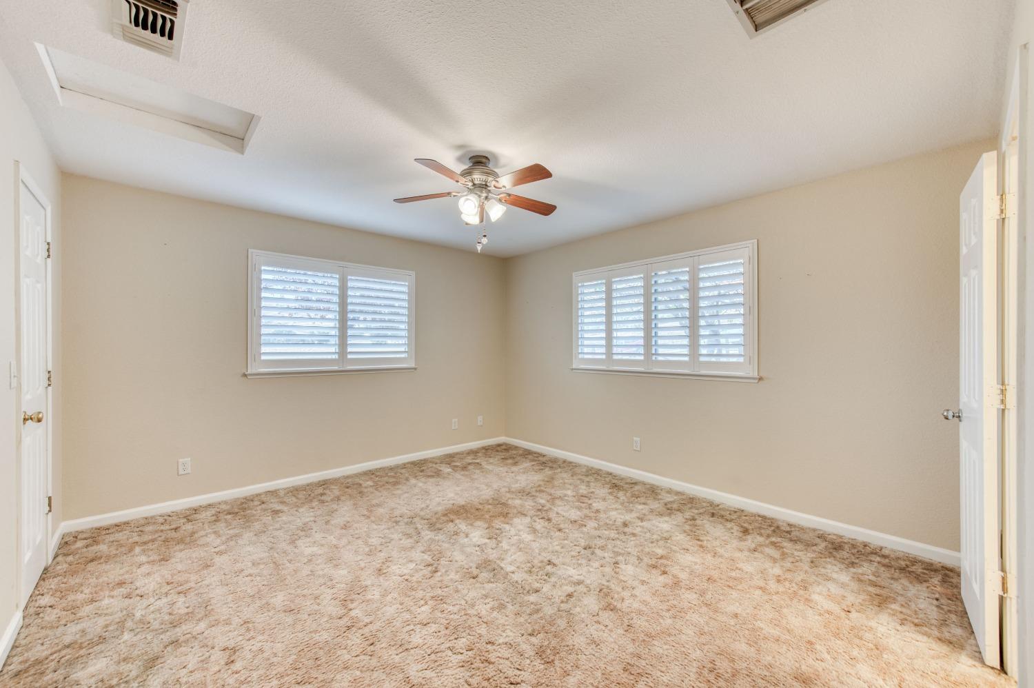 8062 Monreal Drive Sanger, CA 93657 - Photo 14 of 24 a view of an empty room with a window