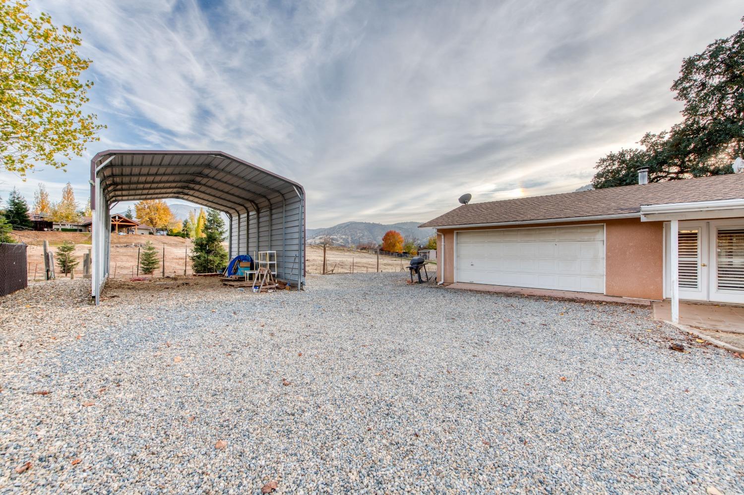 8062 Monreal Drive Sanger, CA 93657 - Photo 17 of 24 a view of car parked in front of house
