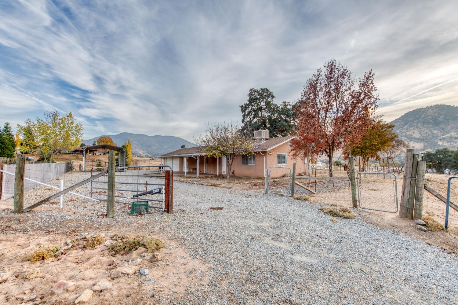 8062 Monreal Drive Sanger, CA 93657 - Photo 23 of 24 a view of a house with a backyard
