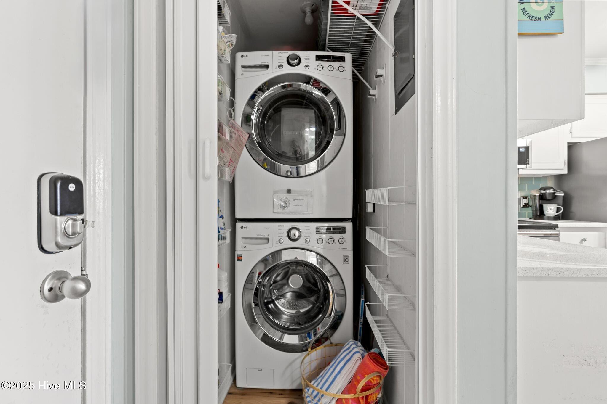 277 West First Street, Unit 1I Ocean Isle Beach, NC 28469 - Photo 29 of 43 Washer/dryer in pantry.