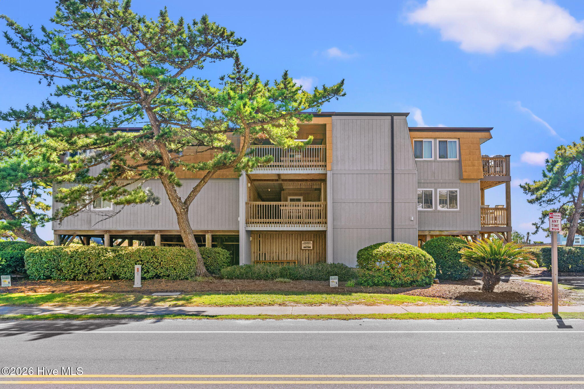 277 West First Street, Unit 1I Ocean Isle Beach, NC 28469 - Photo 39 of 43 Street front exterior of building.