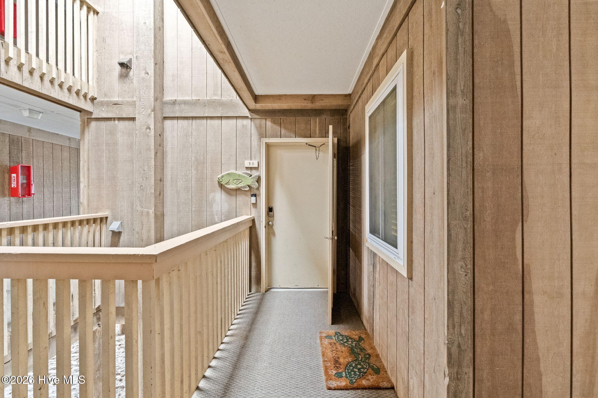 277 West First Street, Unit 1I Ocean Isle Beach, NC 28469 - Photo 41 of 43 Condo front door.