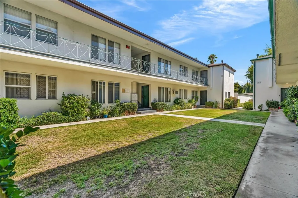 5828 Whitsett Avenue Valley Village, CA 91607 - Photo 4 of 27 a view of a building with a yard