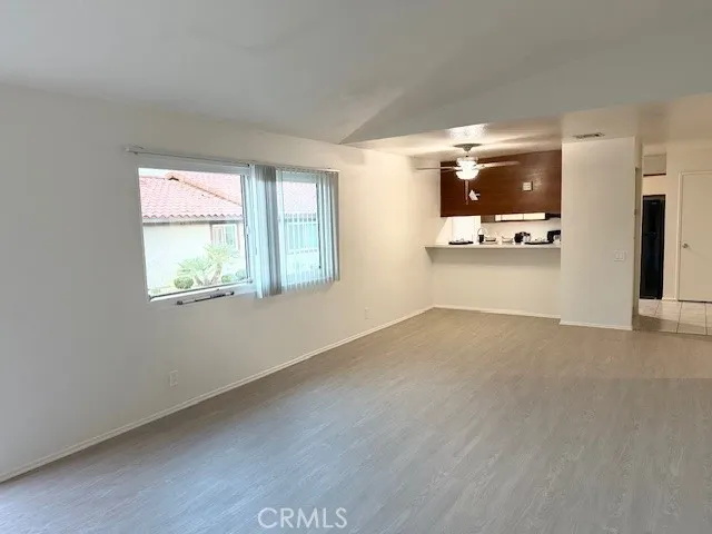 a view of livingroom with furniture and window