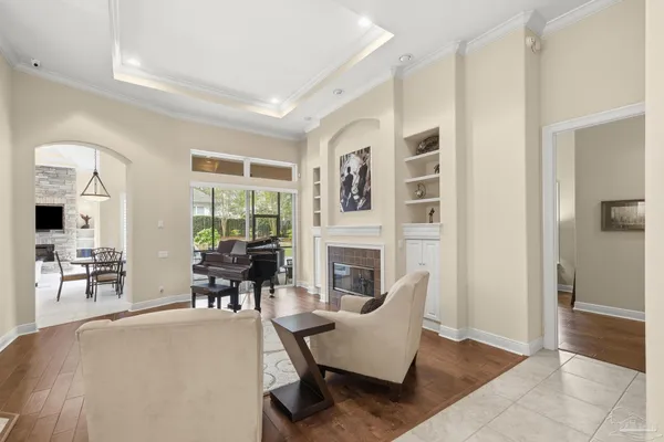 a kitchen with stainless steel appliances granite countertop a sink a stove and a microwave