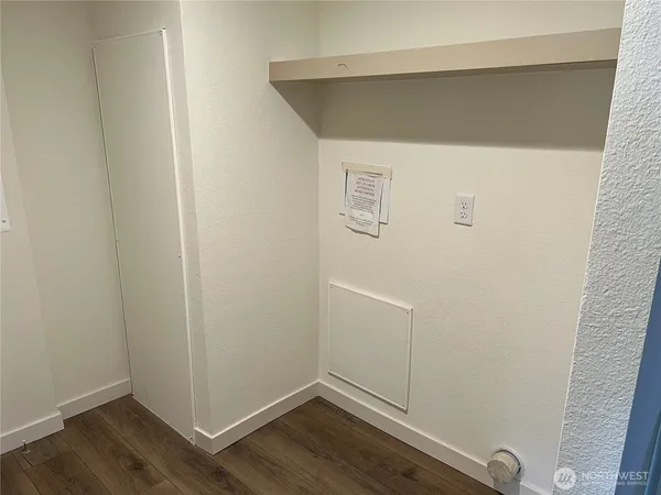 a view of backyard with deck and seating space