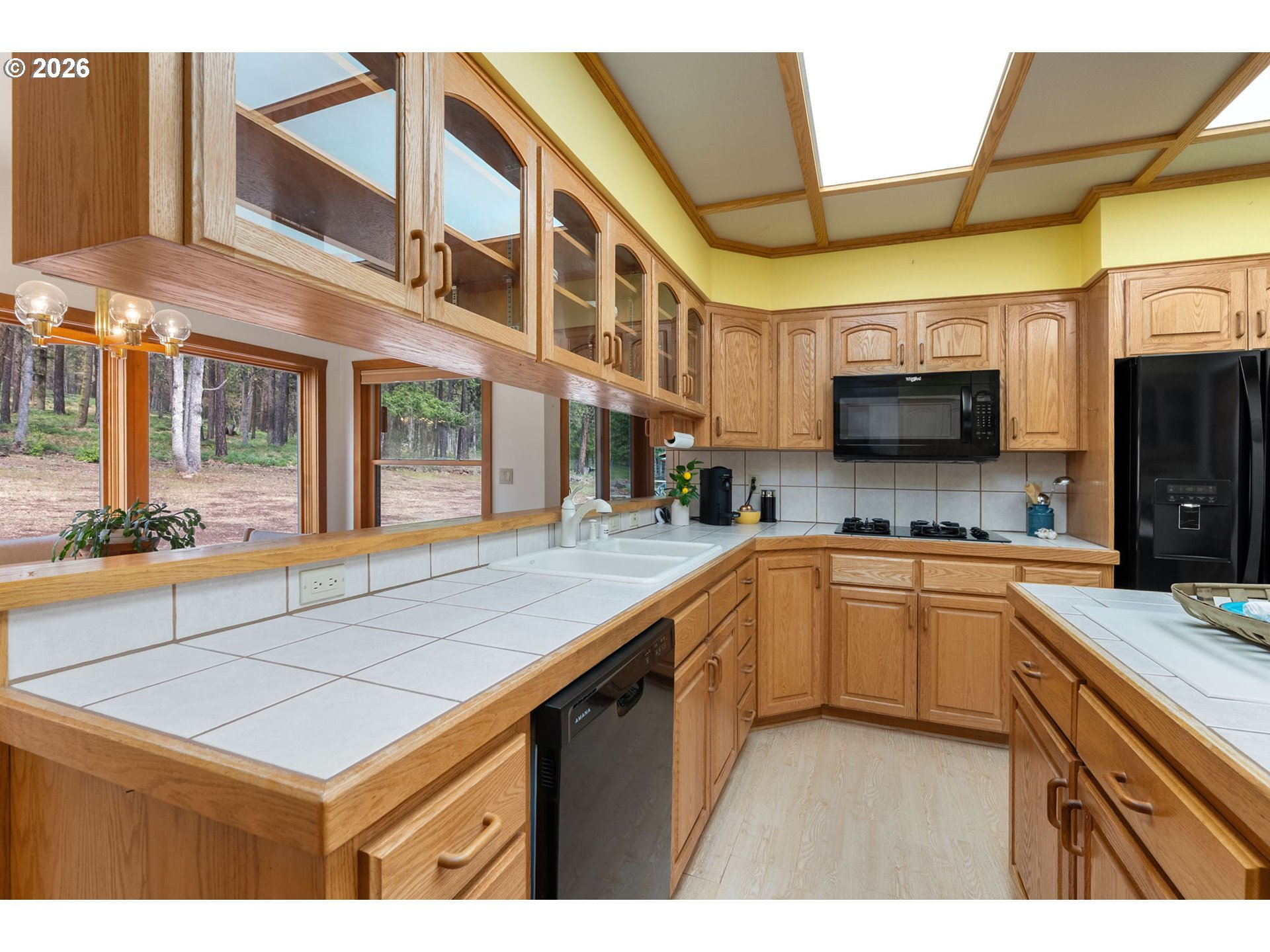 163 Goldenpine Goldendale, WA 98620 - Photo 16 of 43 a kitchen with stainless steel appliances granite countertop a sink and cabinets