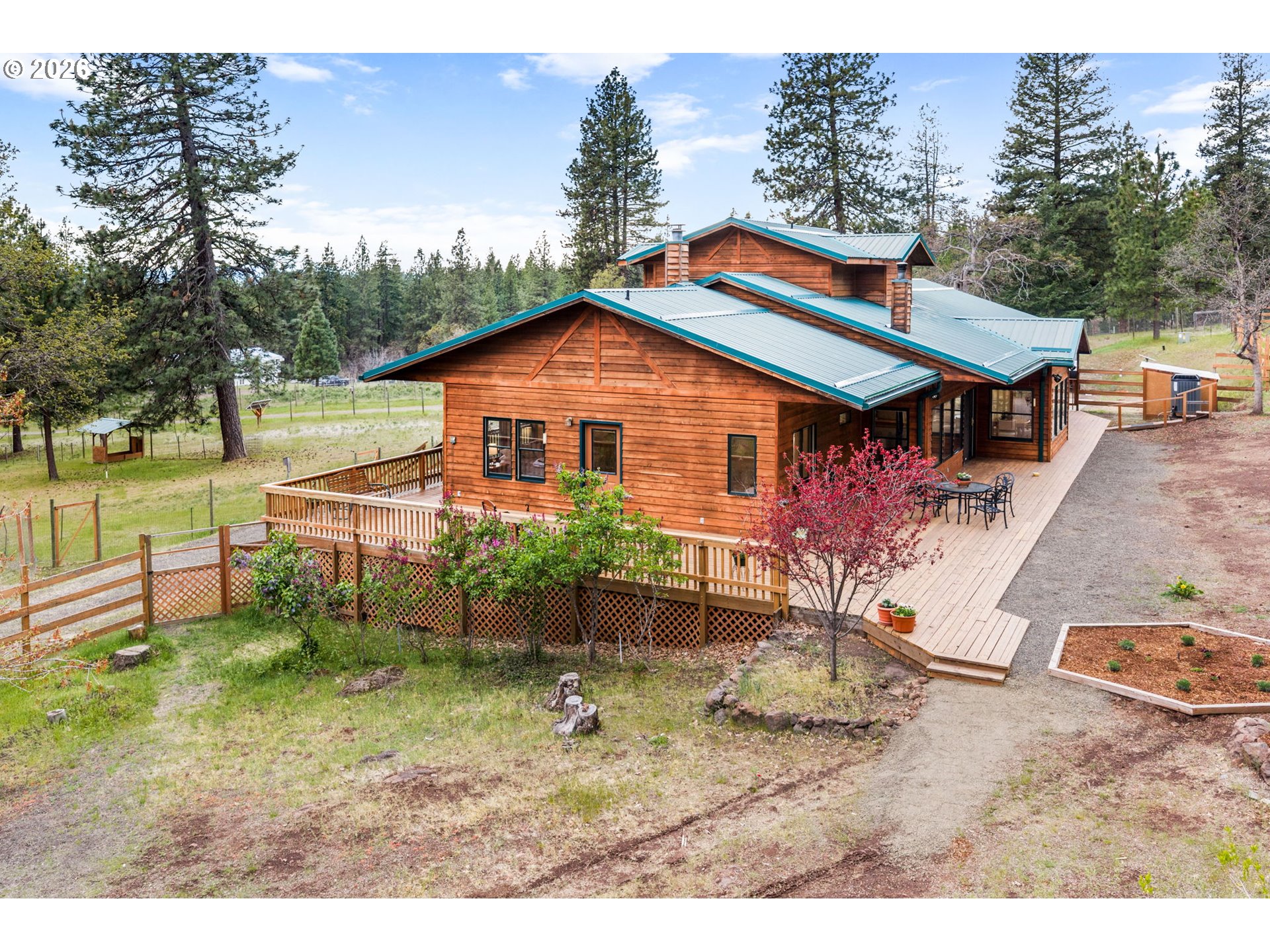 163 Goldenpine Goldendale, WA 98620 - Photo 33 of 43 a backyard of a house with table and chairs