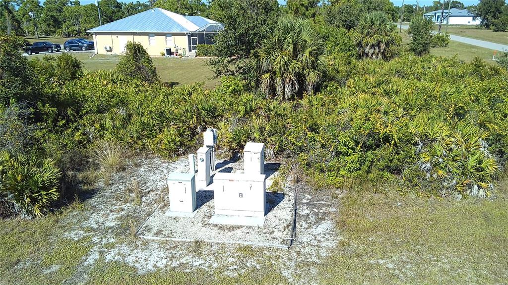 80 Brig Circle East Placida, FL 33946 - Photo 5 of 21 a view of a house with a yard and sitting area