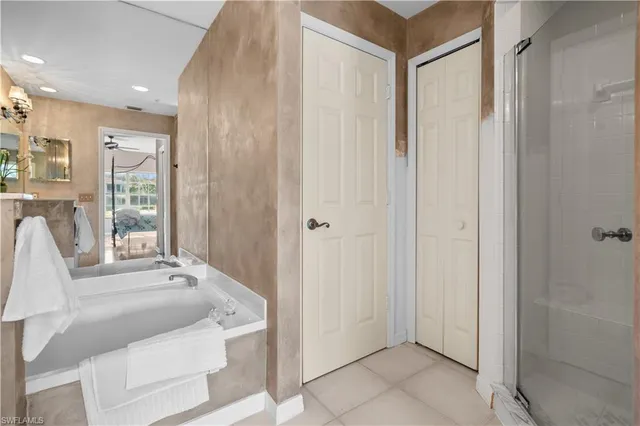 a living room with furniture and a shower