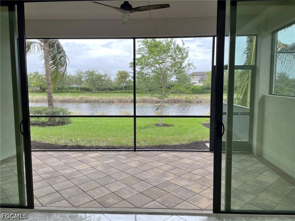 4129 Amelia Way Naples, FL 34119 - Photo 19 of 23 a view of a yard with a big yard