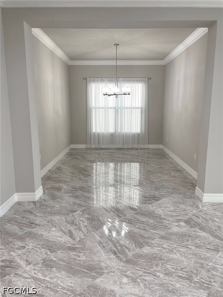 4129 Amelia Way Naples, FL 34119 - Photo 8 of 23 a view of an empty room with a window