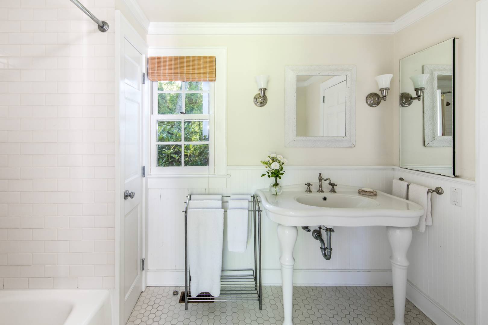 253 Georgica Road East Hampton, NY 11937 - Photo 13 of 19 a bathroom with a sink and a mirror