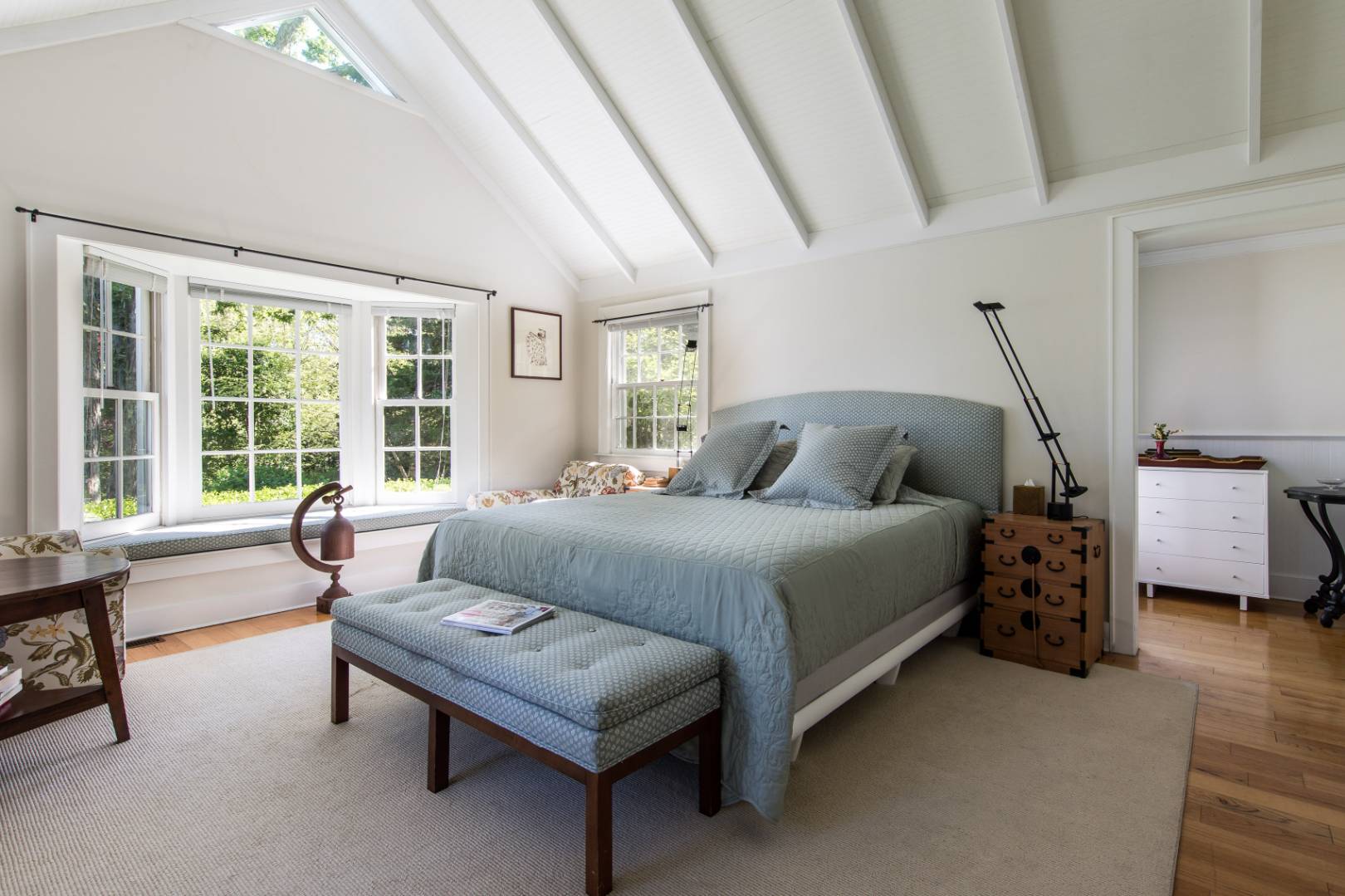 253 Georgica Road East Hampton, NY 11937 - Photo 14 of 19 a bedroom with a bed and a couch