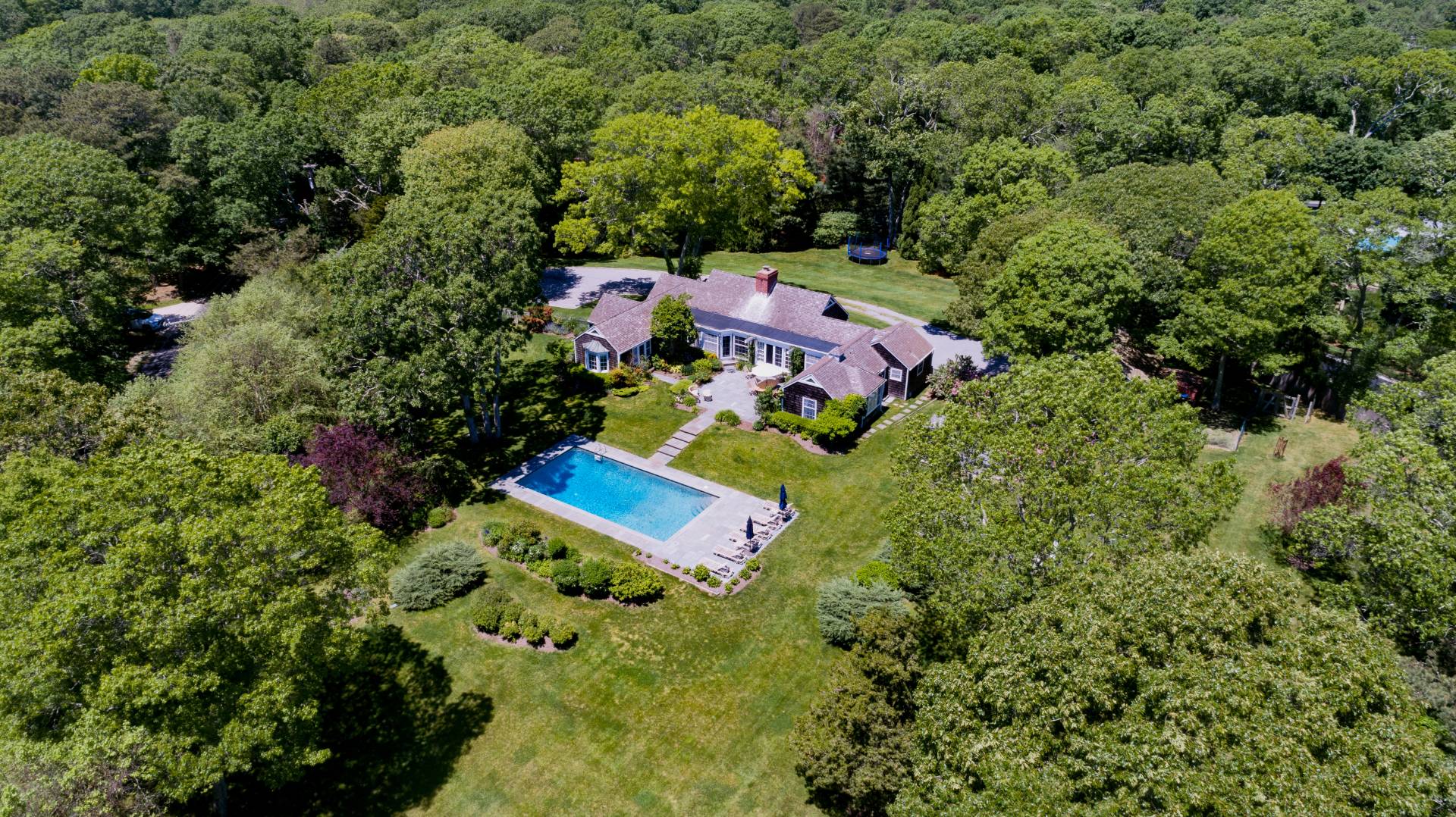 253 Georgica Road East Hampton, NY 11937 - Photo 15 of 19 an aerial view of a house with a yard