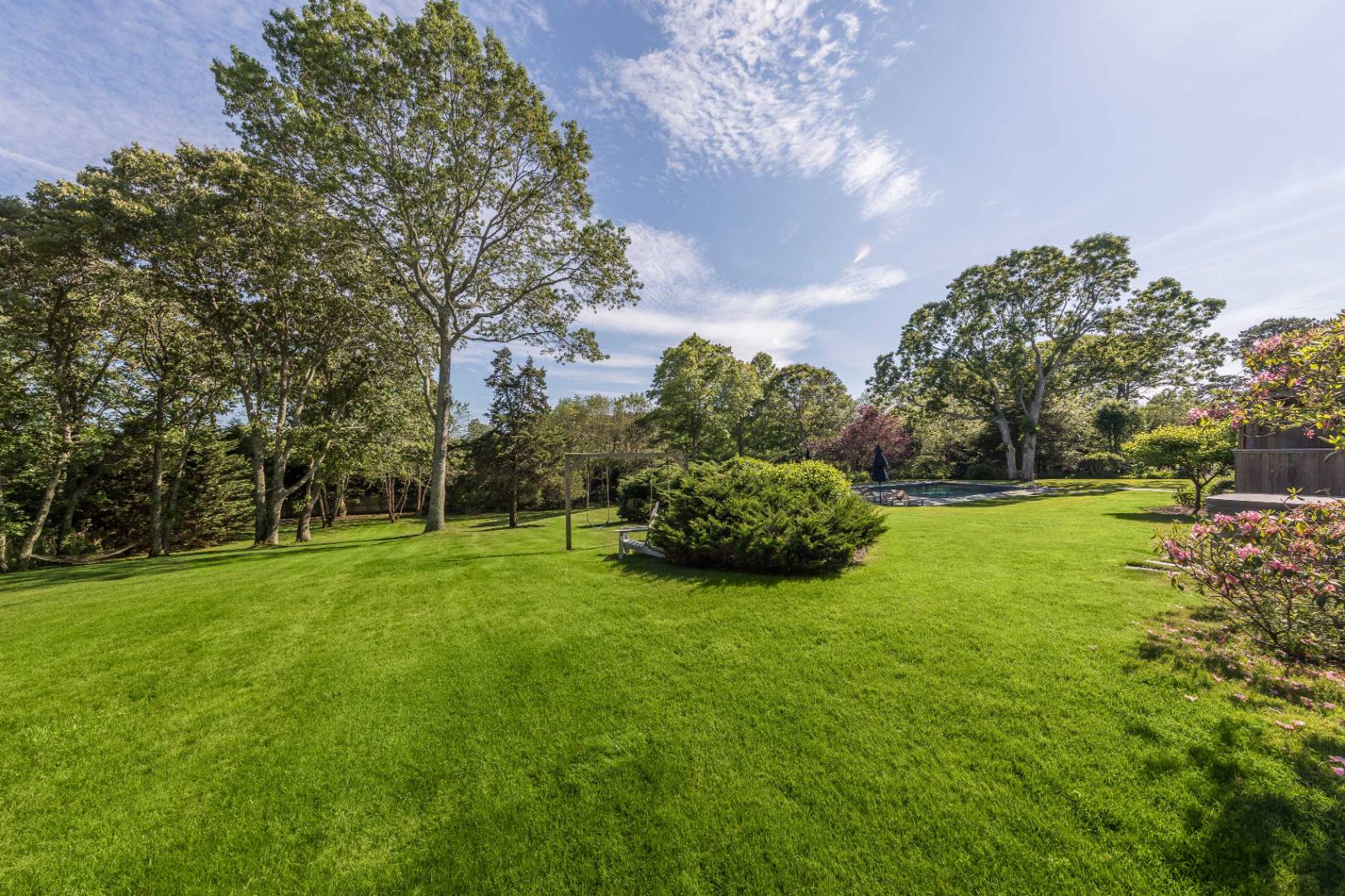253 Georgica Road East Hampton, NY 11937 - Photo 6 of 19 a view of a big yard with large trees