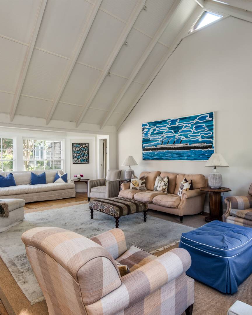 253 Georgica Road East Hampton, NY 11937 - Photo 9 of 19 a living room with furniture ceiling fan and a rug