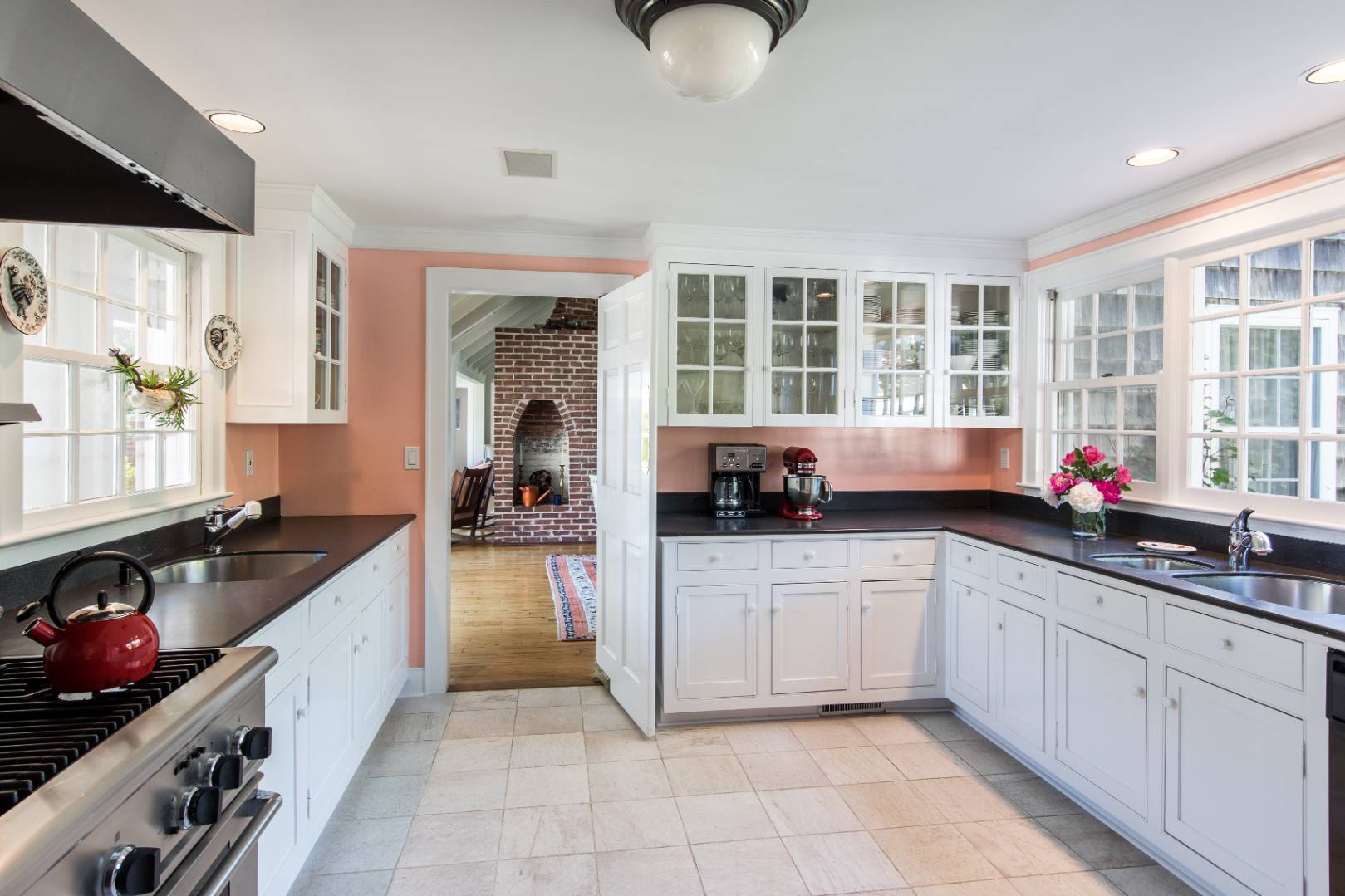 253 Georgica Road East Hampton, NY 11937 - Photo 10 of 19 a kitchen with a sink and cabinets