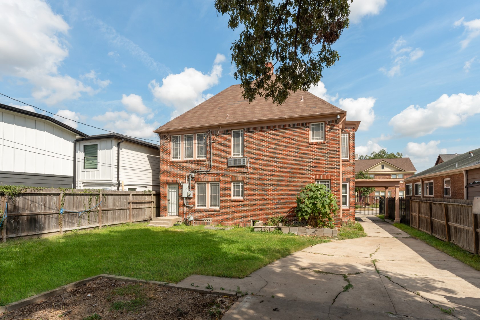 2624 Arbor Street Houston, TX 77004 - Photo 24 of 26 a view of a house with a yard