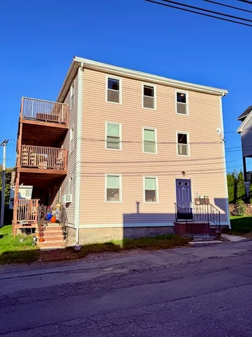 a front view of a house with entertaining space