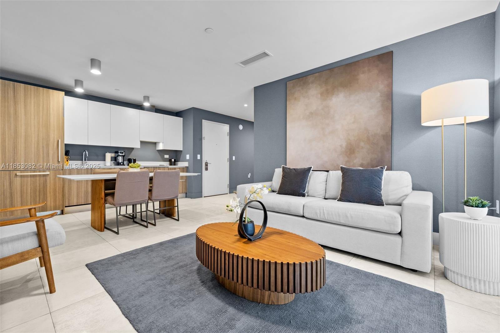 239 Southwest 9th Street, Unit 2303 Miami, FL 33130 - Photo 29 of 75 a living room with furniture and a table