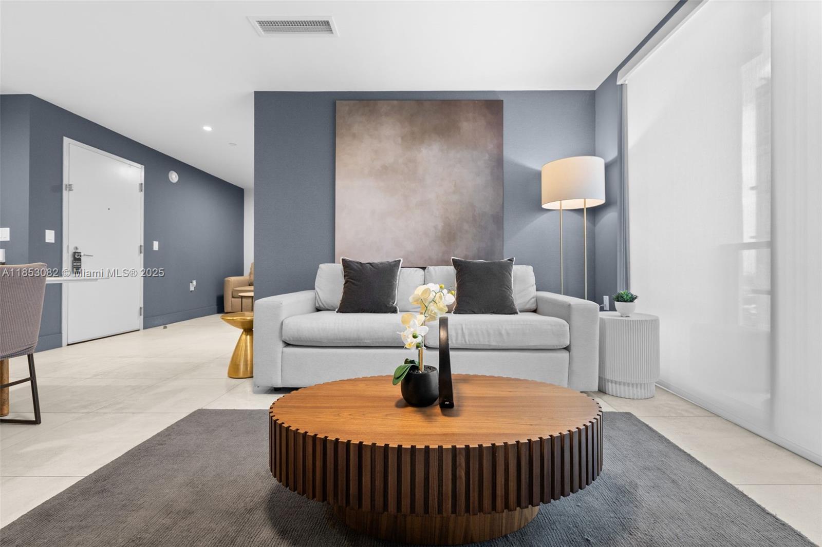 239 Southwest 9th Street, Unit 2303 Miami, FL 33130 - Photo 30 of 75 a living room with furniture and a table