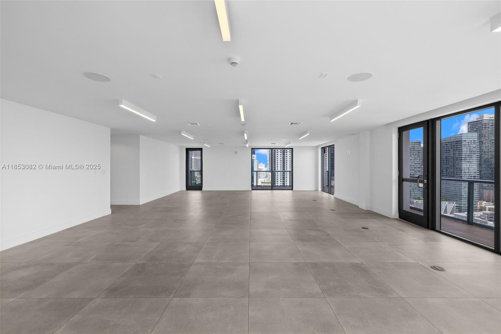 239 Southwest 9th Street, Unit 2303 Miami, FL 33130 - Photo 55 of 75 a view of empty room with windows