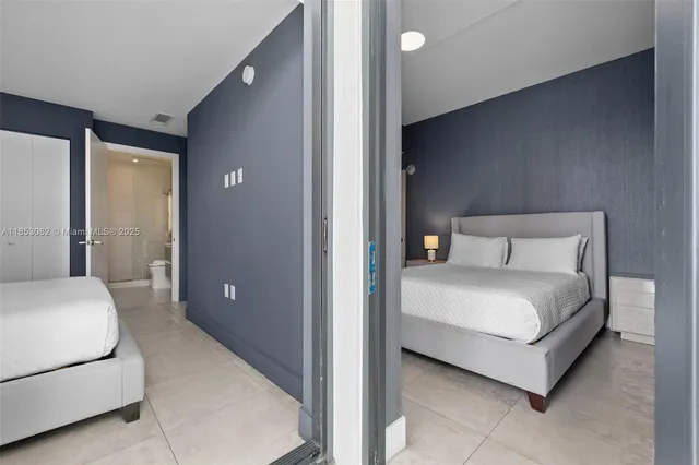 a view of a bathroom from a hallway