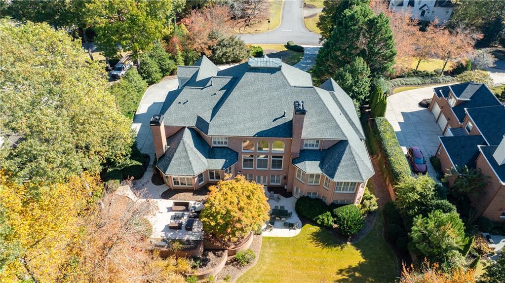 9390 Colonnade Trail Alpharetta, GA 30022 - Photo 110 of 122 an aerial view of a house with swimming pool and large trees