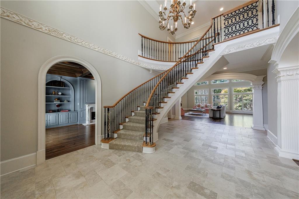 9390 Colonnade Trail Alpharetta, GA 30022 - Photo 3 of 122 a view of entryway and hall with a front door