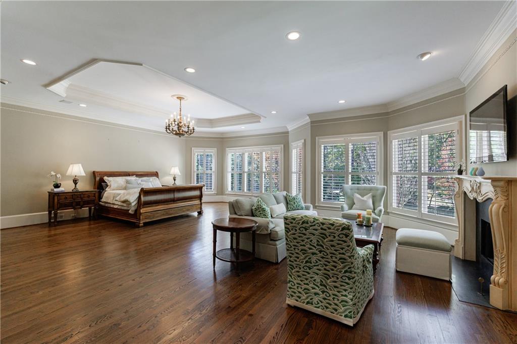 9390 Colonnade Trail Alpharetta, GA 30022 - Photo 31 of 122 a living room with furniture and wooden floor