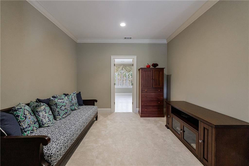 9390 Colonnade Trail Alpharetta, GA 30022 - Photo 53 of 122 a living room with furniture and a walk in closet
