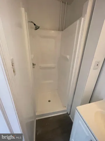 a view of an empty walk in closet