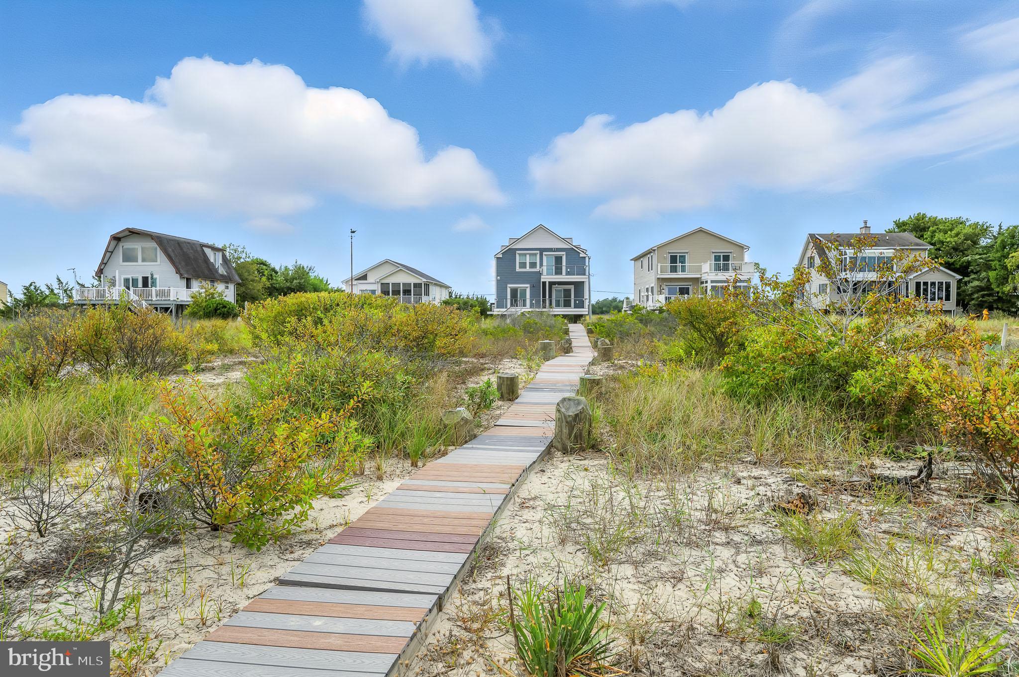 549 Bay Avenue Milford, DE 19963 - Photo 47 of 60 a view of a city with flower plants and wooden fence