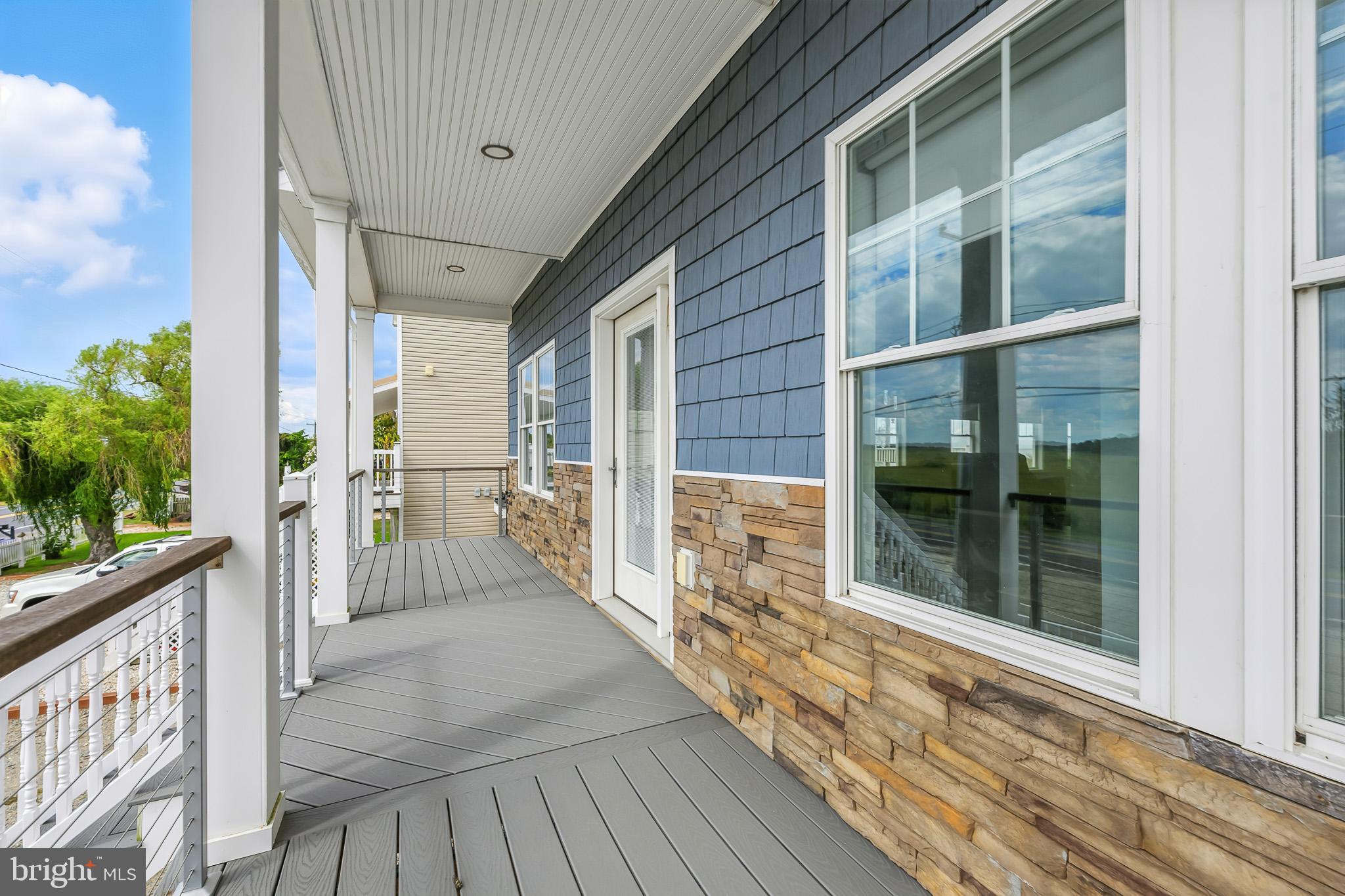 549 Bay Avenue Milford, DE 19963 - Photo 6 of 60 a view of a house with a porch