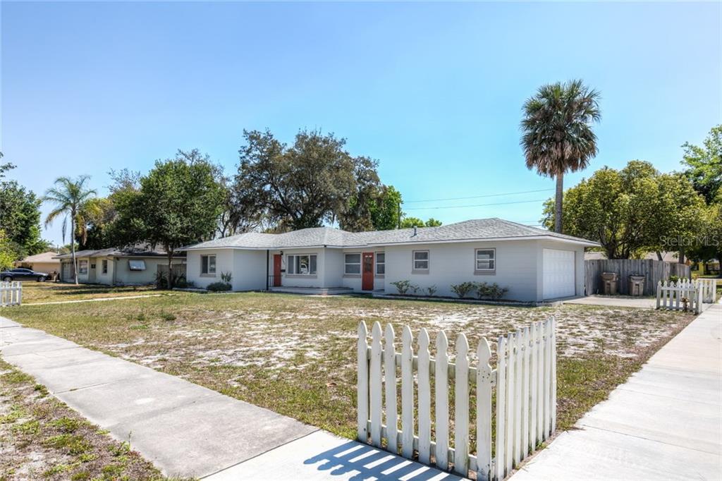 2790 Westland Road Mount Dora, FL 32757 - Photo 1 of 1 a front view of a house with garden