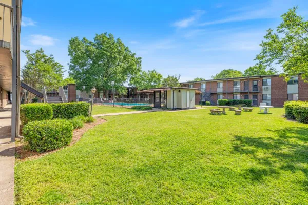 a view of a house with a big yard