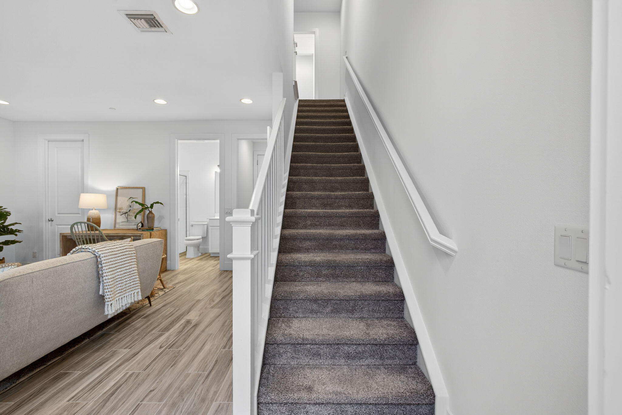 13392 Alton Road Palm Beach Gardens, FL 33418 - Photo 12 of 57 a view of entryway and hall with wooden floor